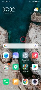 Podržte prst na volném místě domovské obrazovky