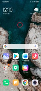 Podržte prst na volném místě domovské obrazovky